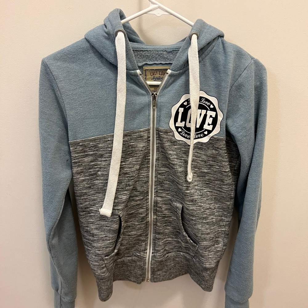 Woman’s blue/grey jacket